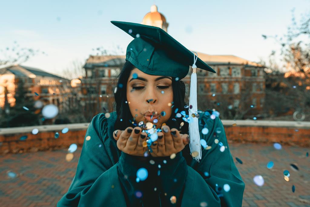 https://seva-wealth.com/wp-content/uploads/2026/01/College-Graduate-in-teal-graduation-Cap-and-gown_Education-Planning_College-Planning_Advisor-IO.jpg