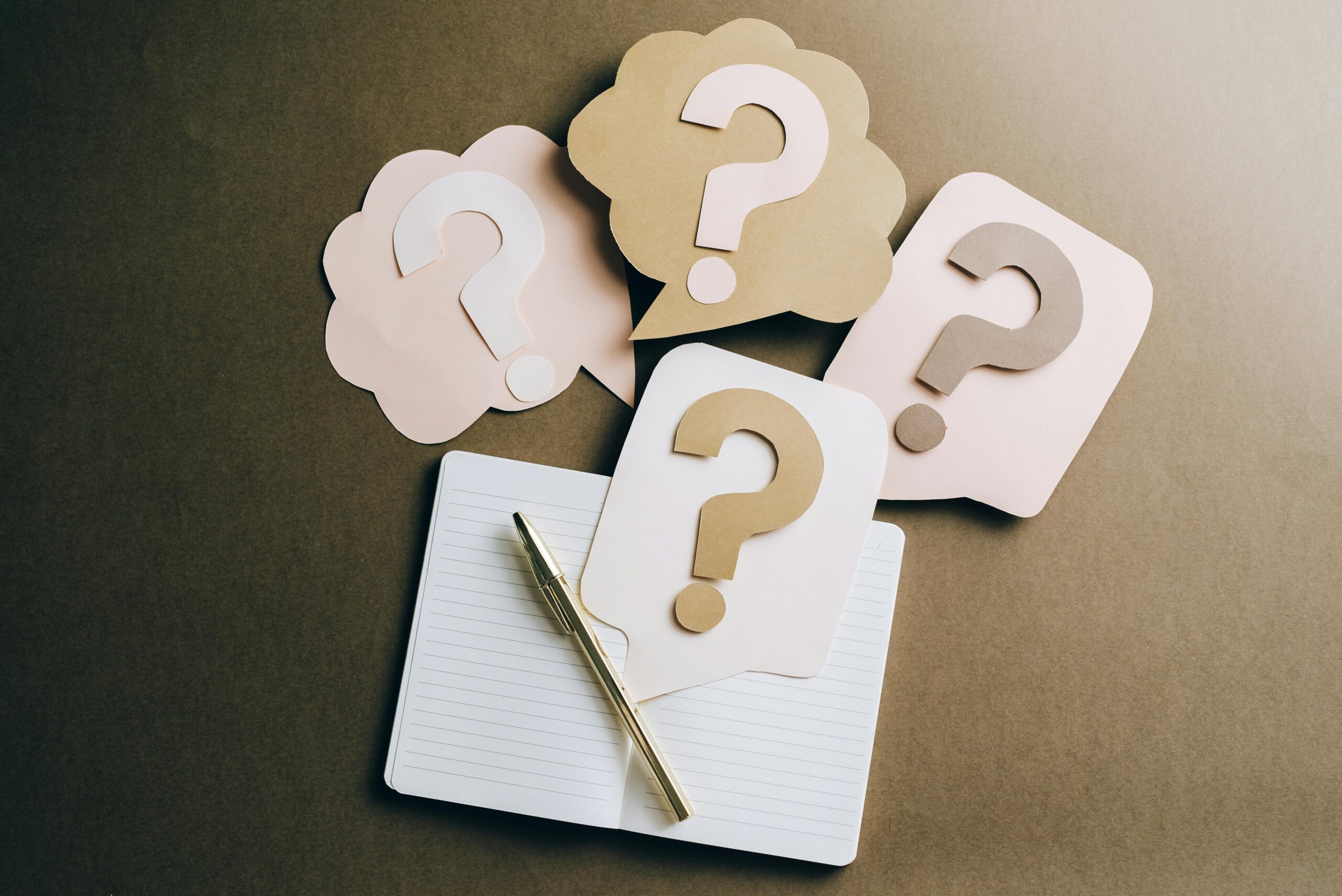 Question Marks_FAQs_Frequently Asked Questins_with Pen and paper_pexels-leeloothefirst-5428830 https://seva-wealth.com/wp-content/uploads/2026/01/Question-Marks_FAQs_Frequently-Asked-Questins_with-Pen-and-paper_pexels-leeloothefirst-5428830-scaled.jpeg